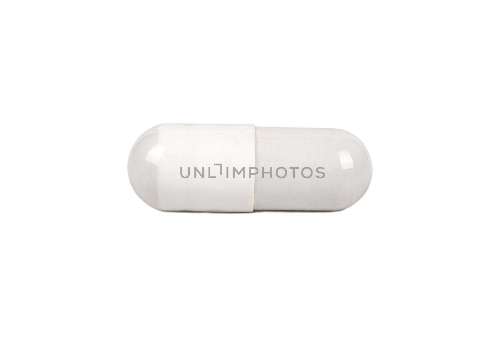 Grey capsule isolated on a white background