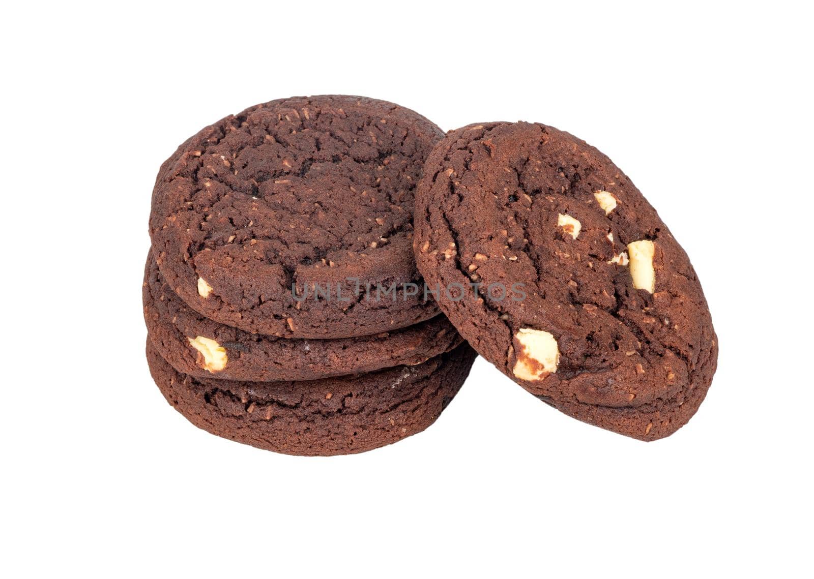 Stack of chocolate cookies with coconut slices on a white background