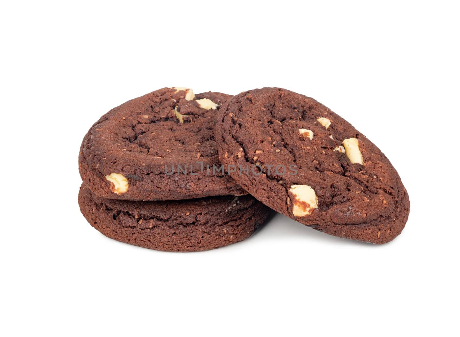 Three chocolate cookies with coconut slices on a white background