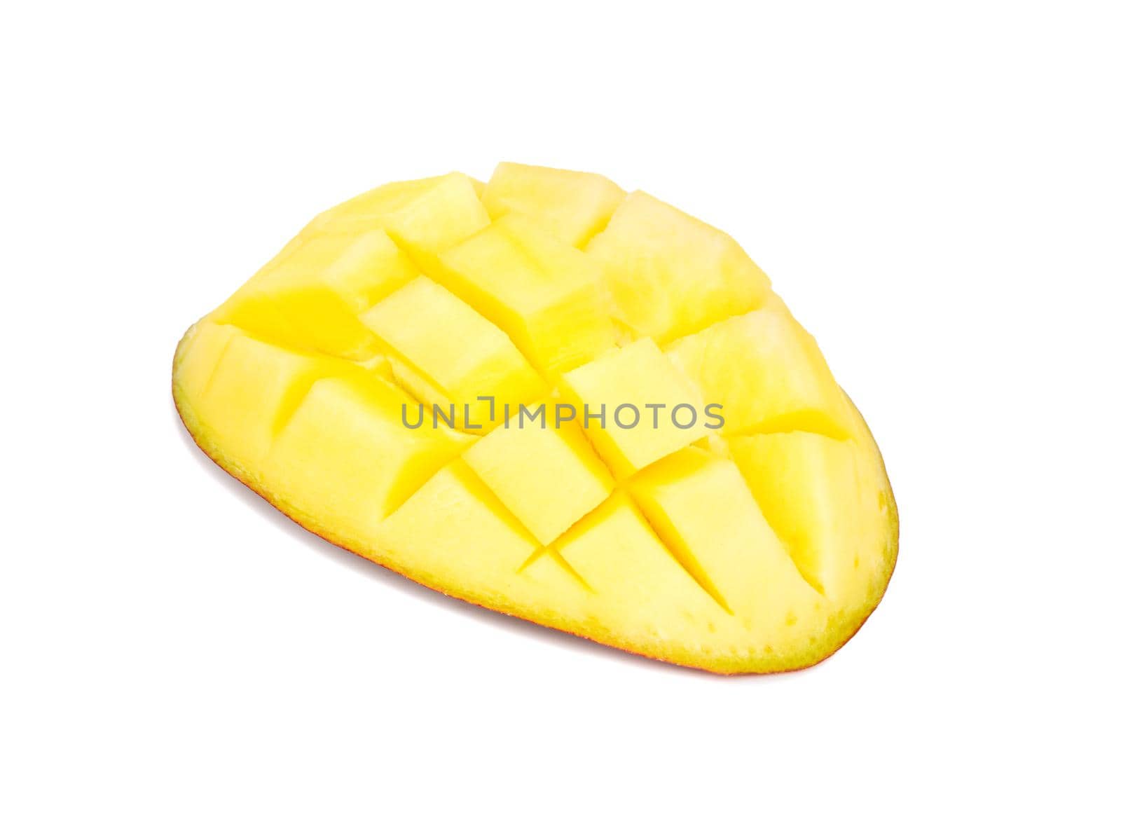 Sliced half of mango fruit isolated on a white background