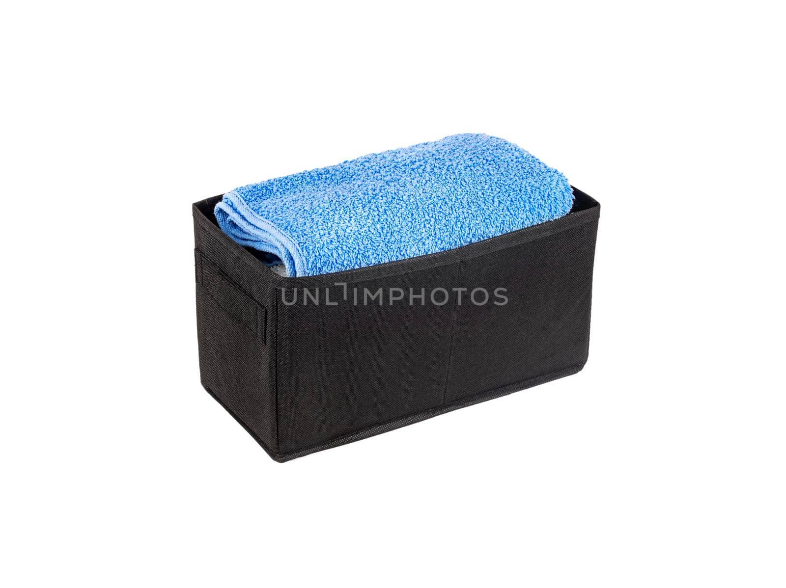 Black box with towel isolated on white background