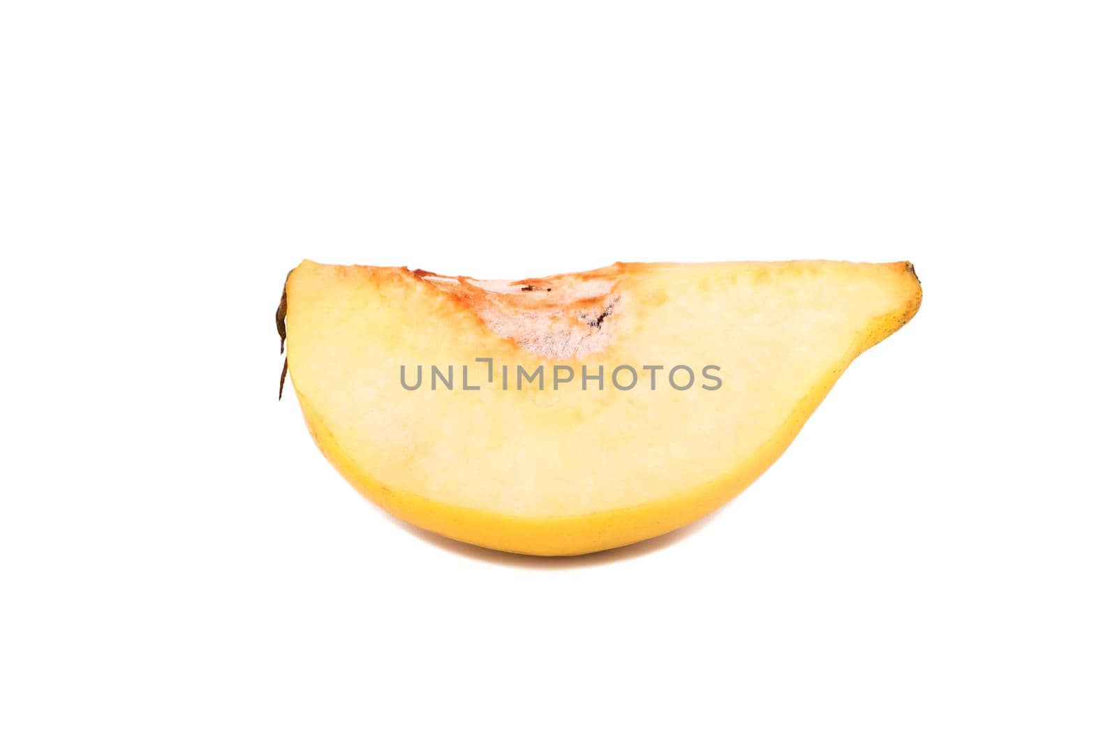 Slice of ripe quince fruit isolated on white background