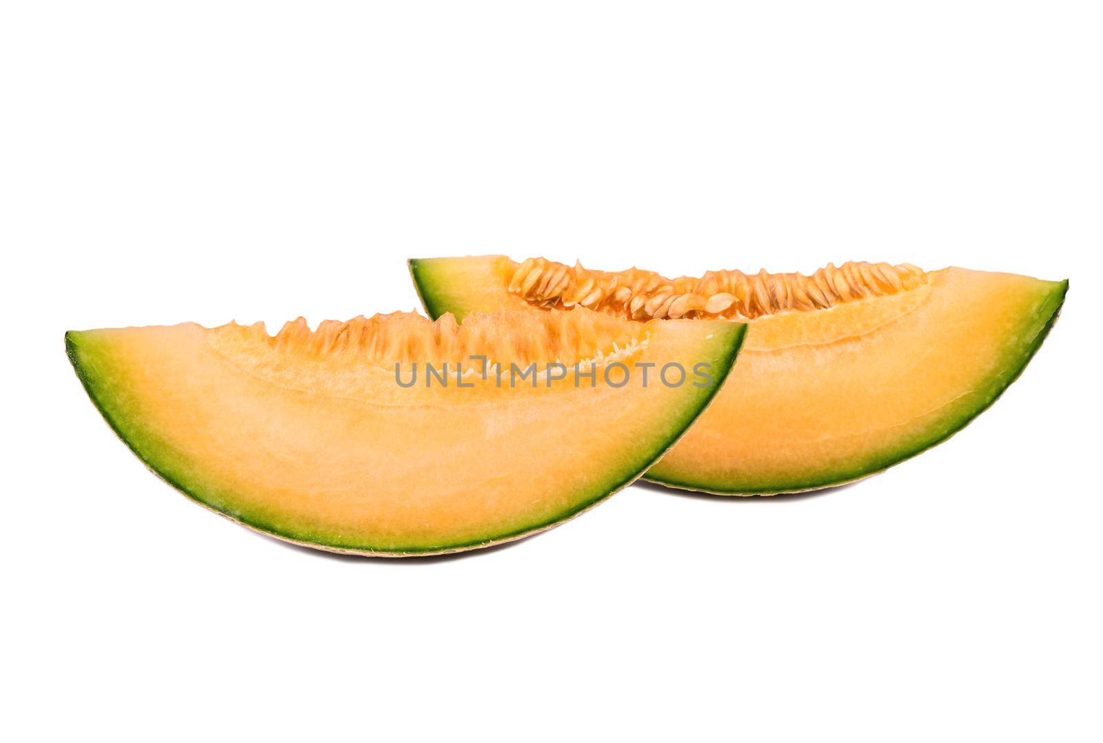 Two slices of fresh cantaloupe melon isolated on white background