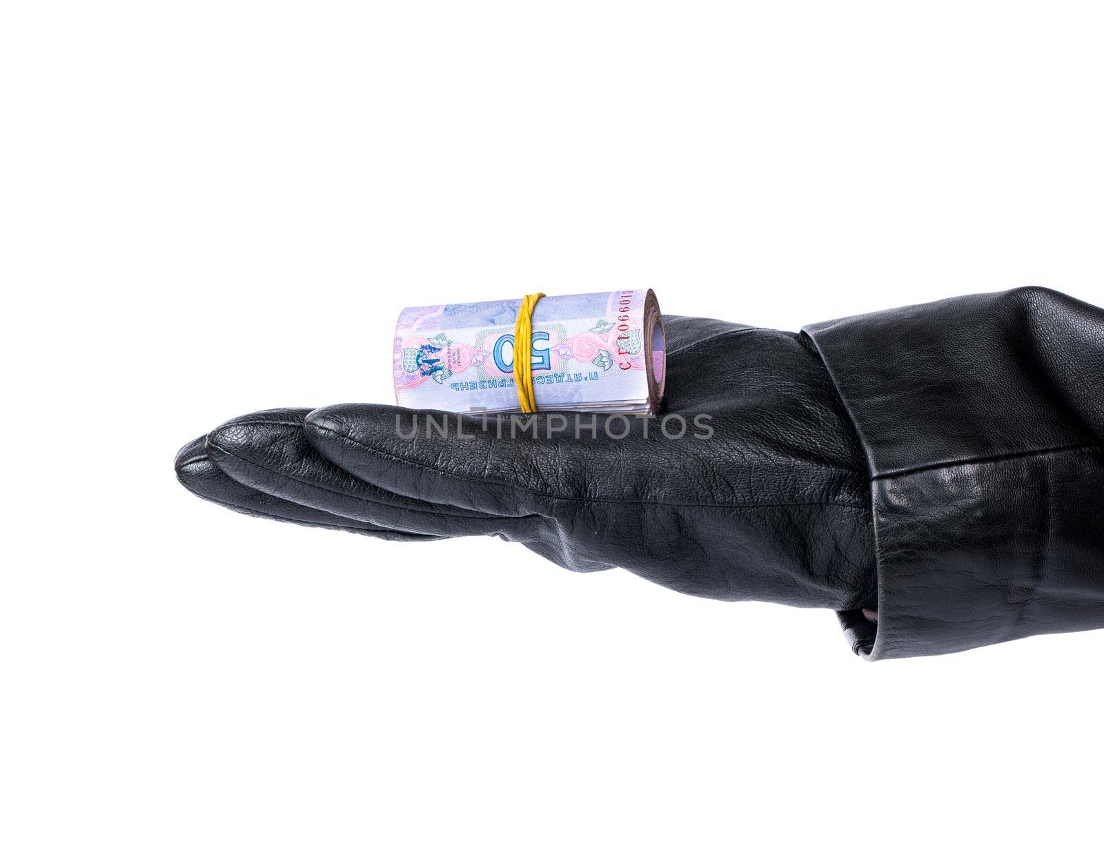 Thief in her hand holding a bunch of stolen Ukrainian money on a white background