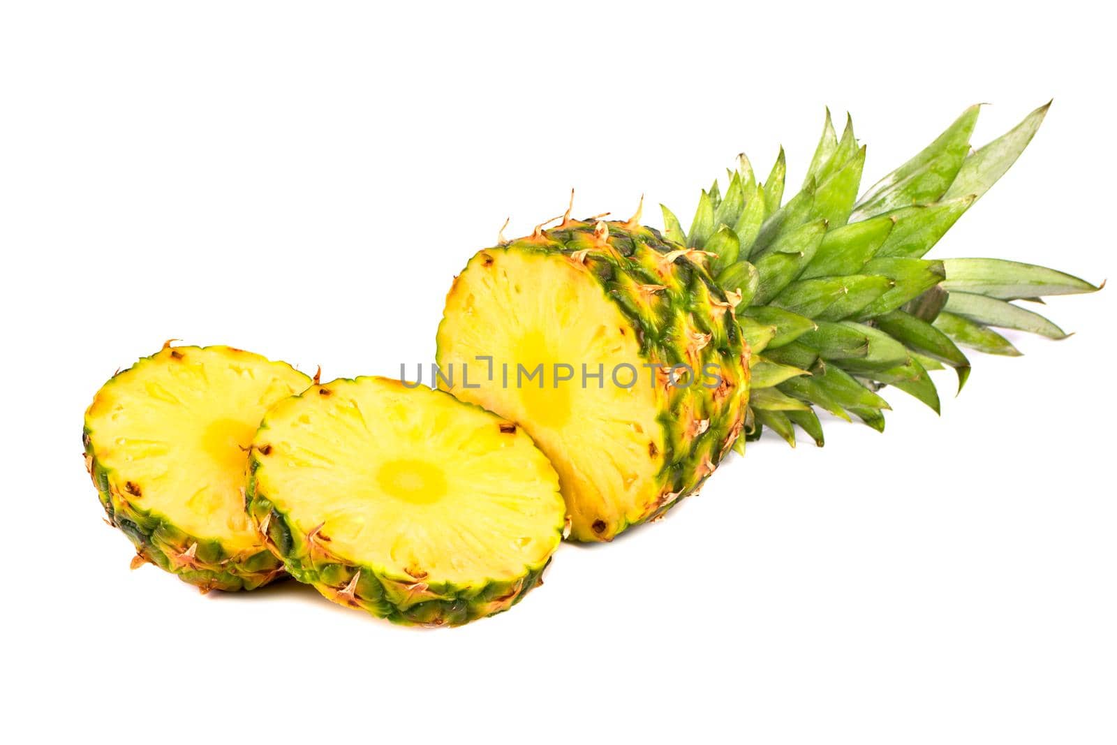 Sliced fresh fruit pineapple on a white background
