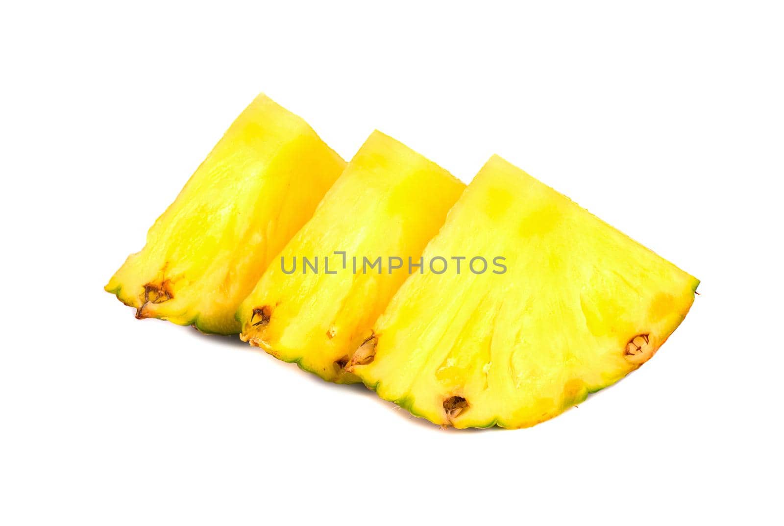 Three slices of juicy fruit pineapple on a white background closeup