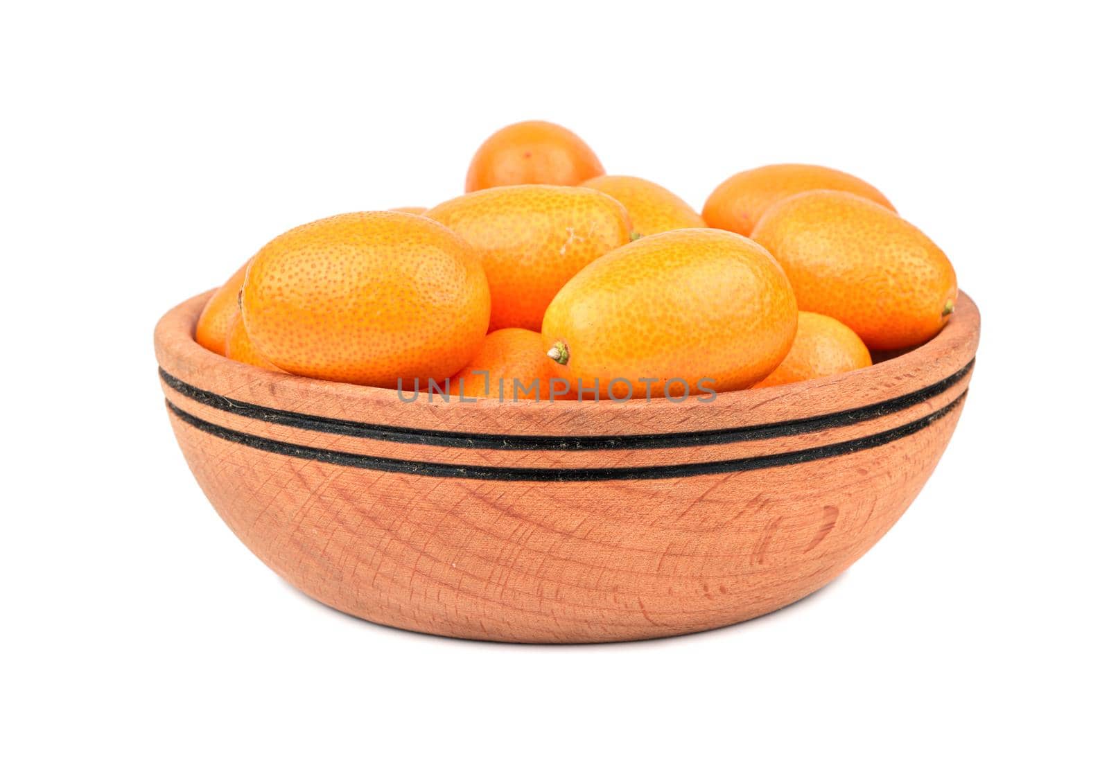 Wooden bowl filled with fruit kumquat isolated on a white background