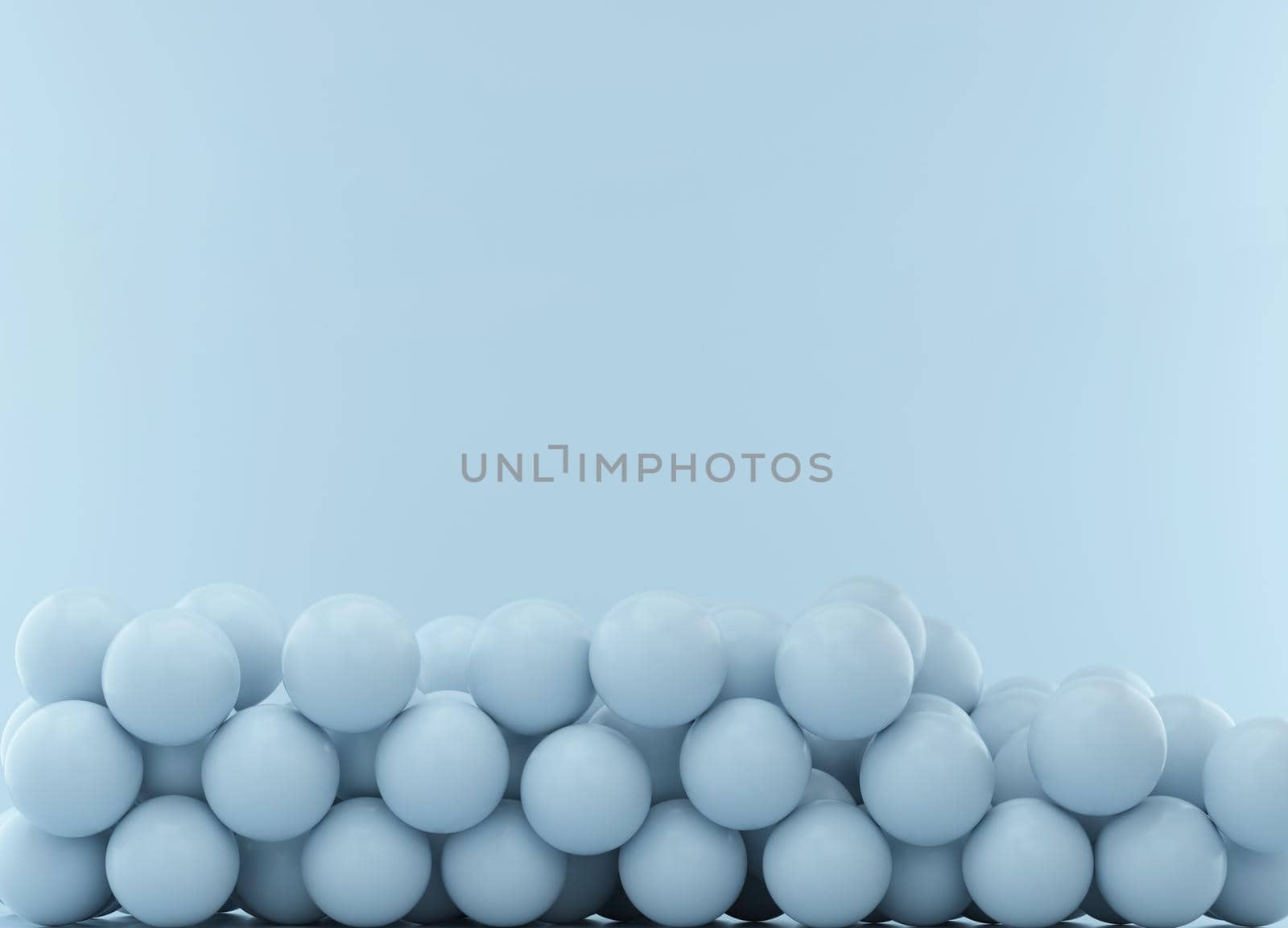 Spheres on blue studio background with space for text or design. 3d rendering.
