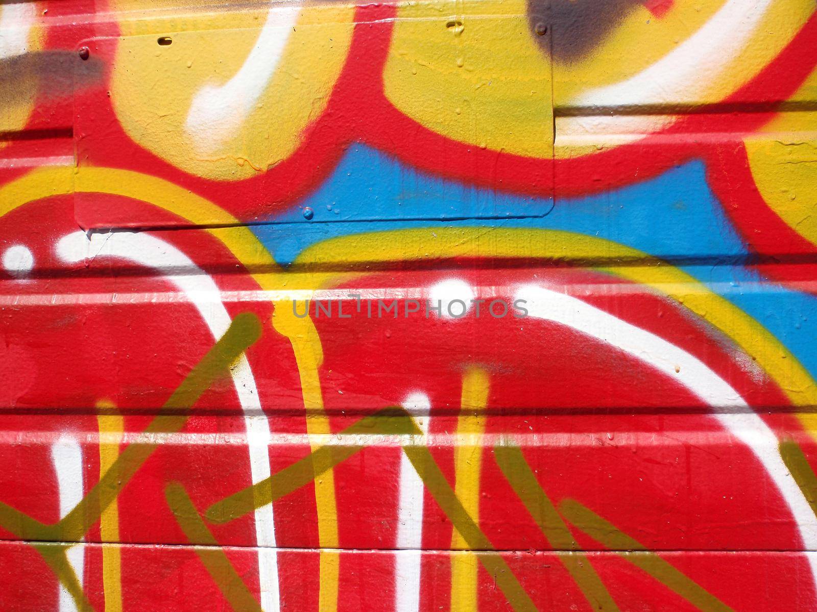 Graffiti Paint close-up of bubble letters with new graffiti sprayed on top.