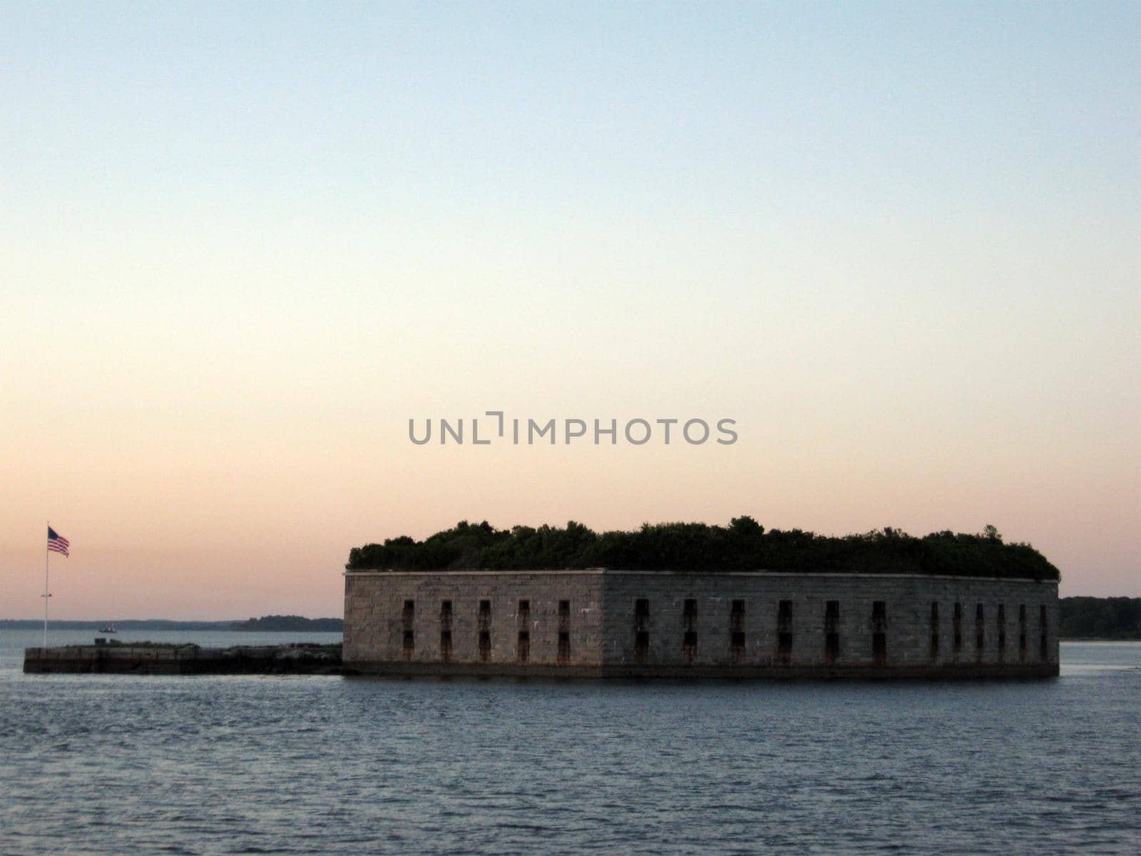 Fort Gorges in Casco Bay at dusk by EricGBVD