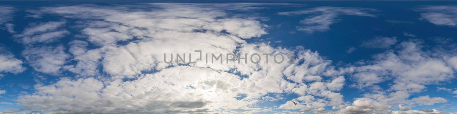 Panorama of a dark blue sunset sky with golden Cumulus clouds. Seamless hdr 360 panorama in spherical equiangular format. Full zenith for 3D visualization, sky replacement for aerial drone panoramas. by Matiunina