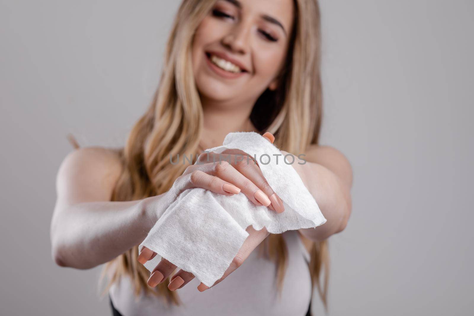 Cleaning hands with wet wipes by adamr