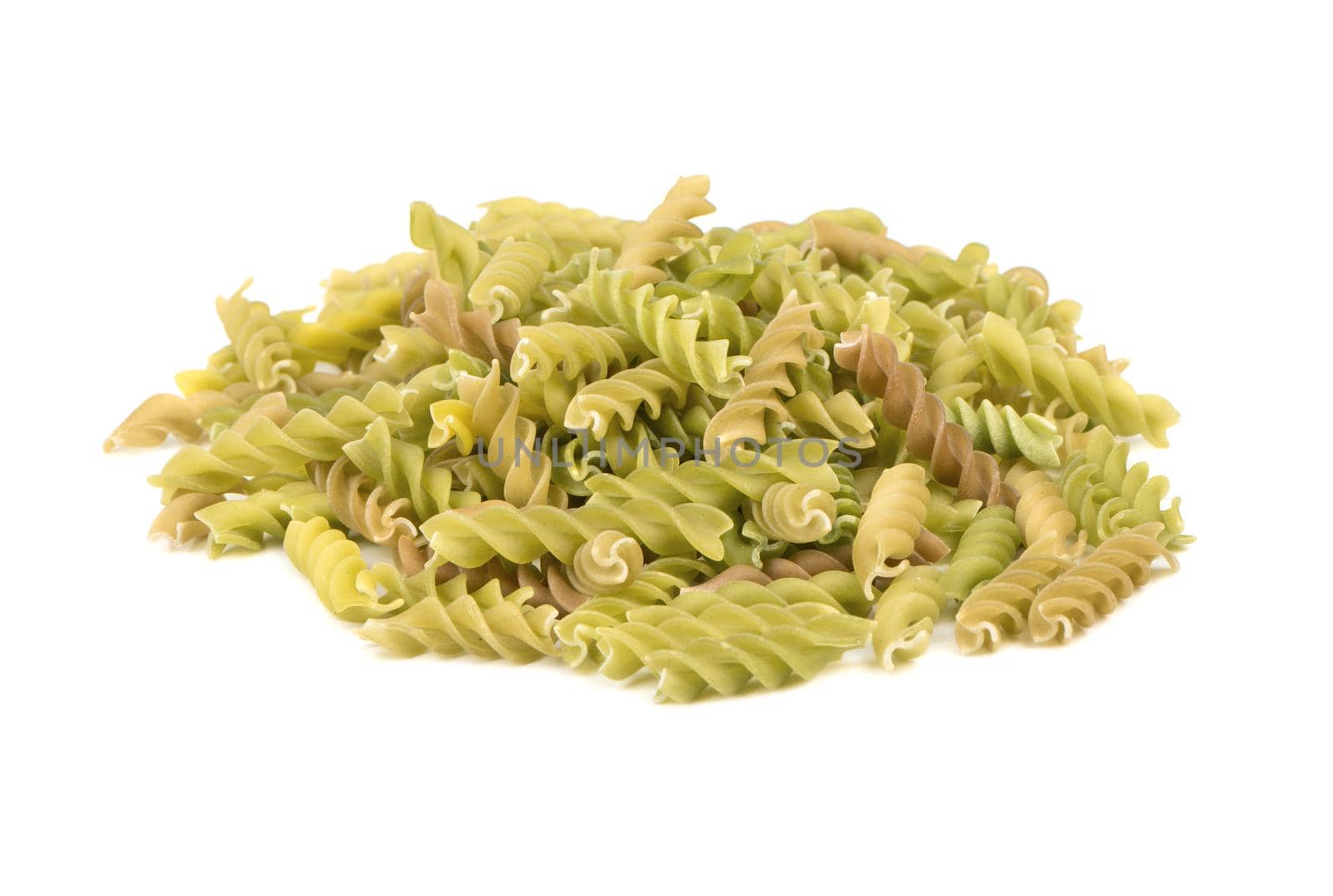 Bunch of green raw pasta fusilli on white background