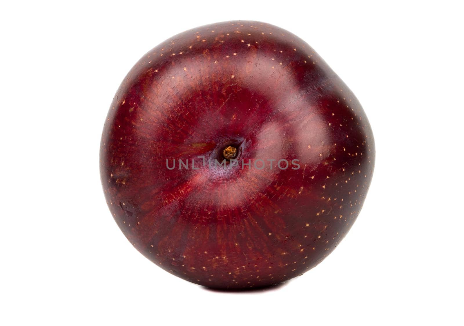 Big red plum isolated on white background