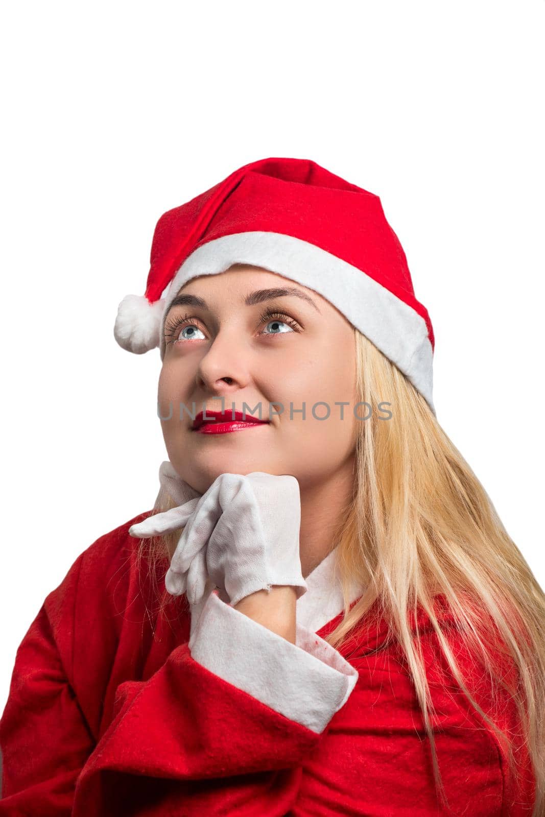 Beautiful girl in red Santa costume on white background