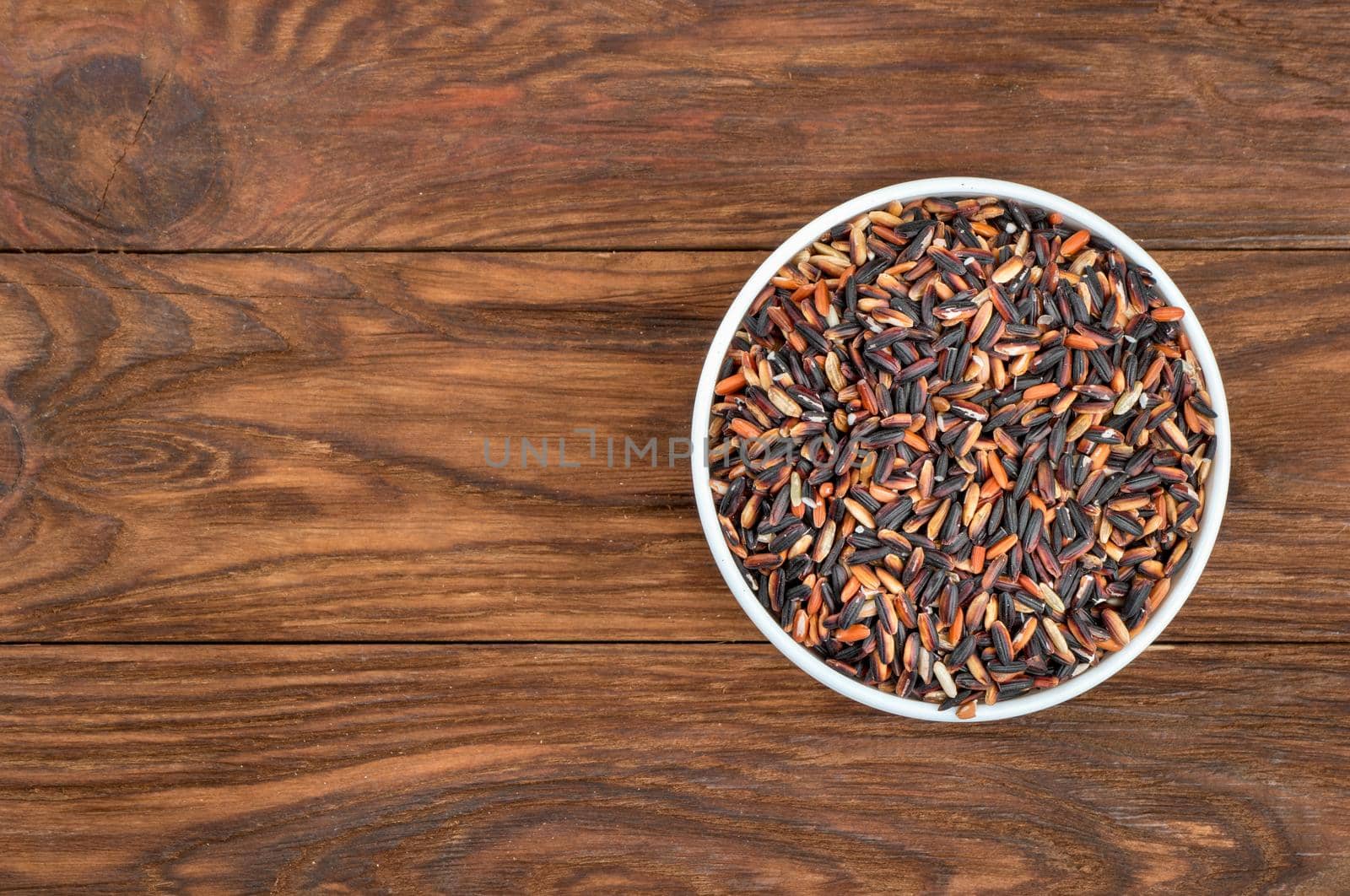 Wild rice in bowl by andregric