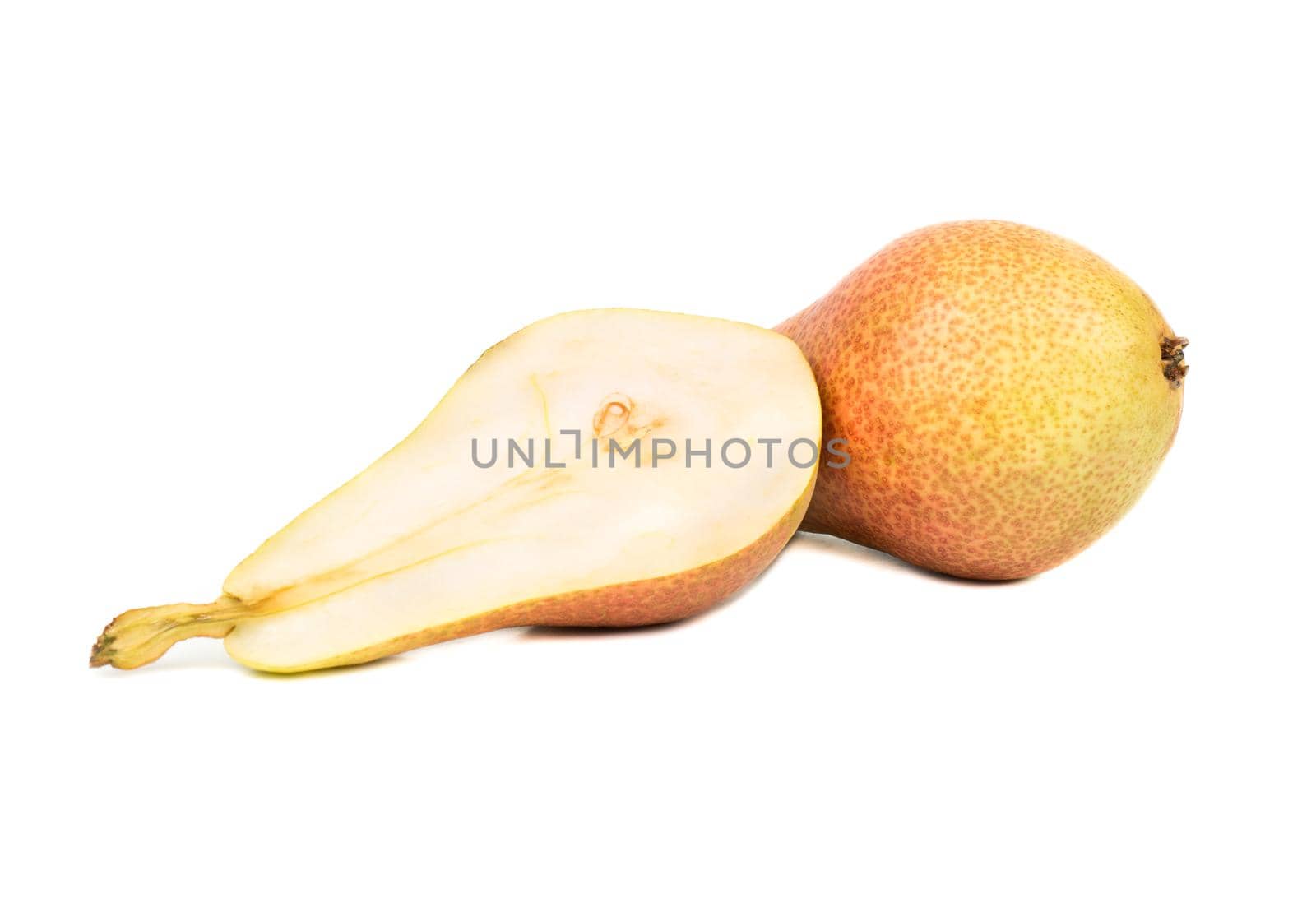 Fresh juicy pear with half on white background