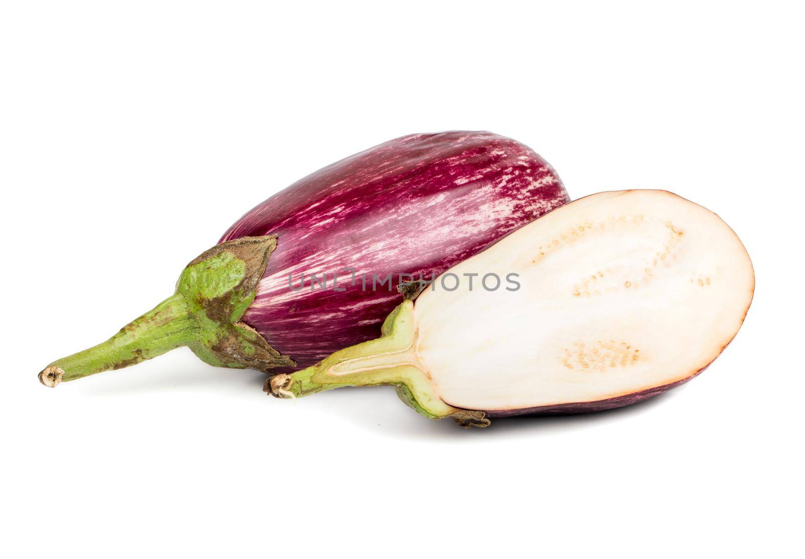 Raw purple eggplant with half on white background