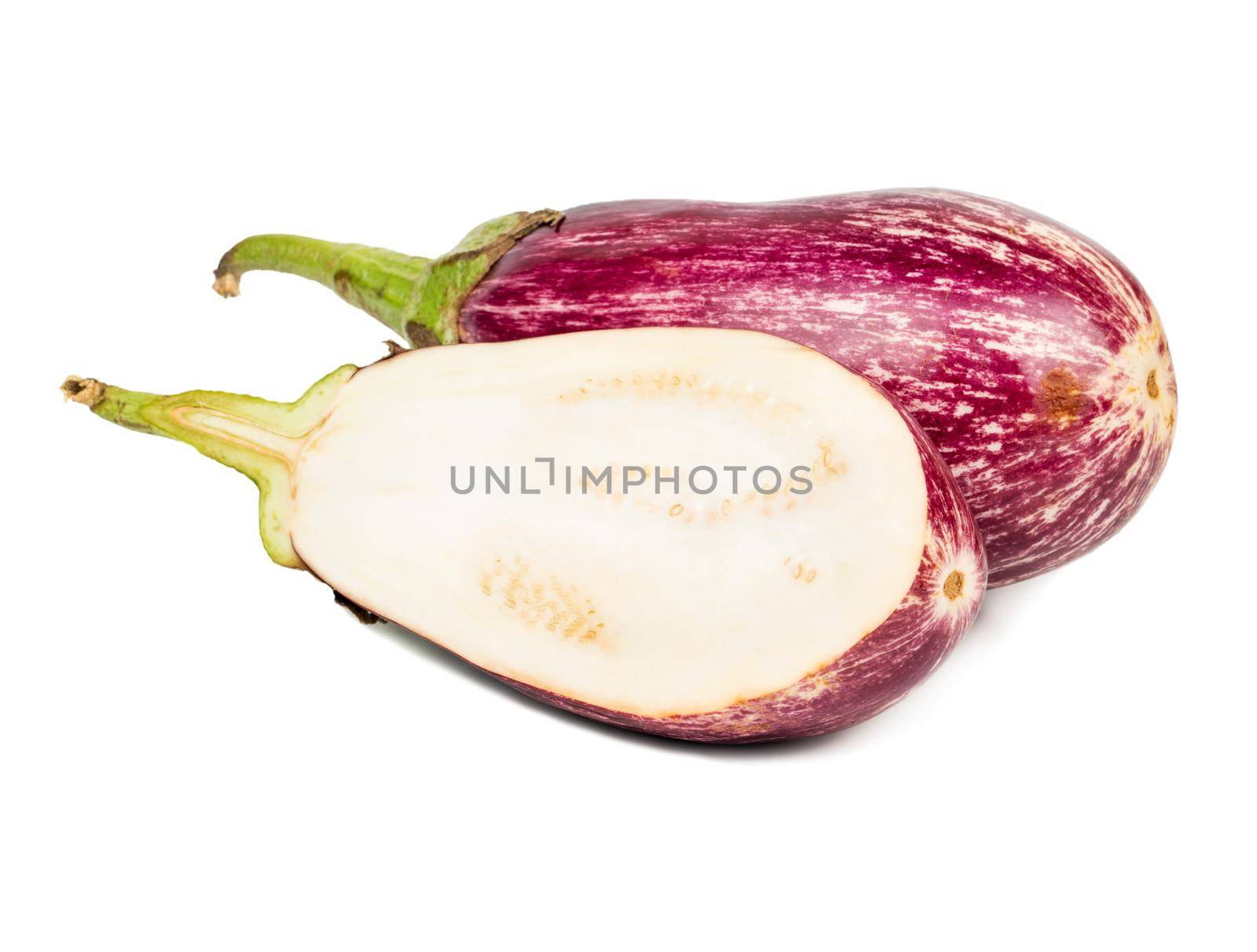 Fresh purple eggplant with half on white background