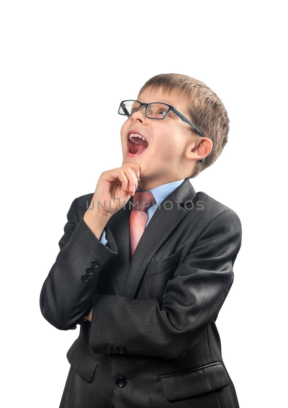 Portrait of a schoolboy looking up with an open mouth on a white background