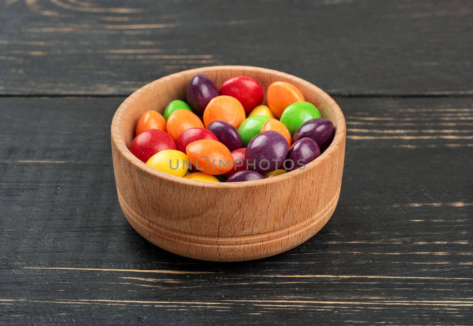 Colorful candy in bowl by andregric