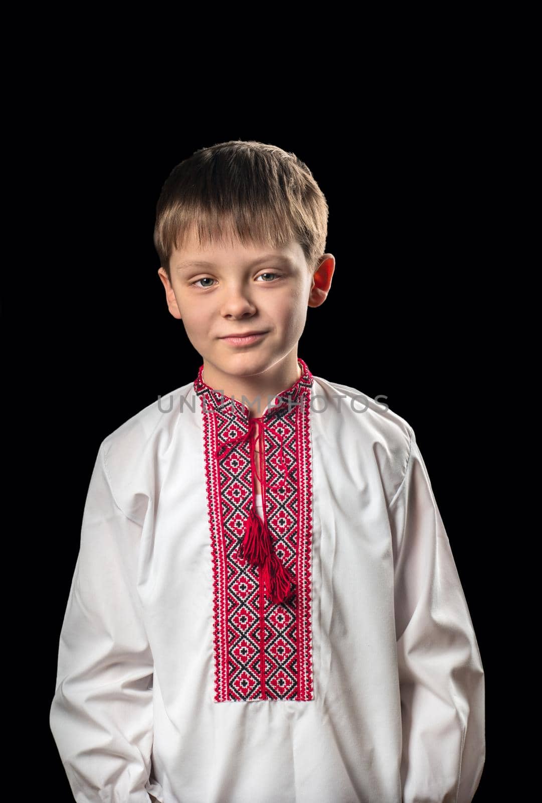 Portrait of a boy in a white traditional Ukrainian shirt