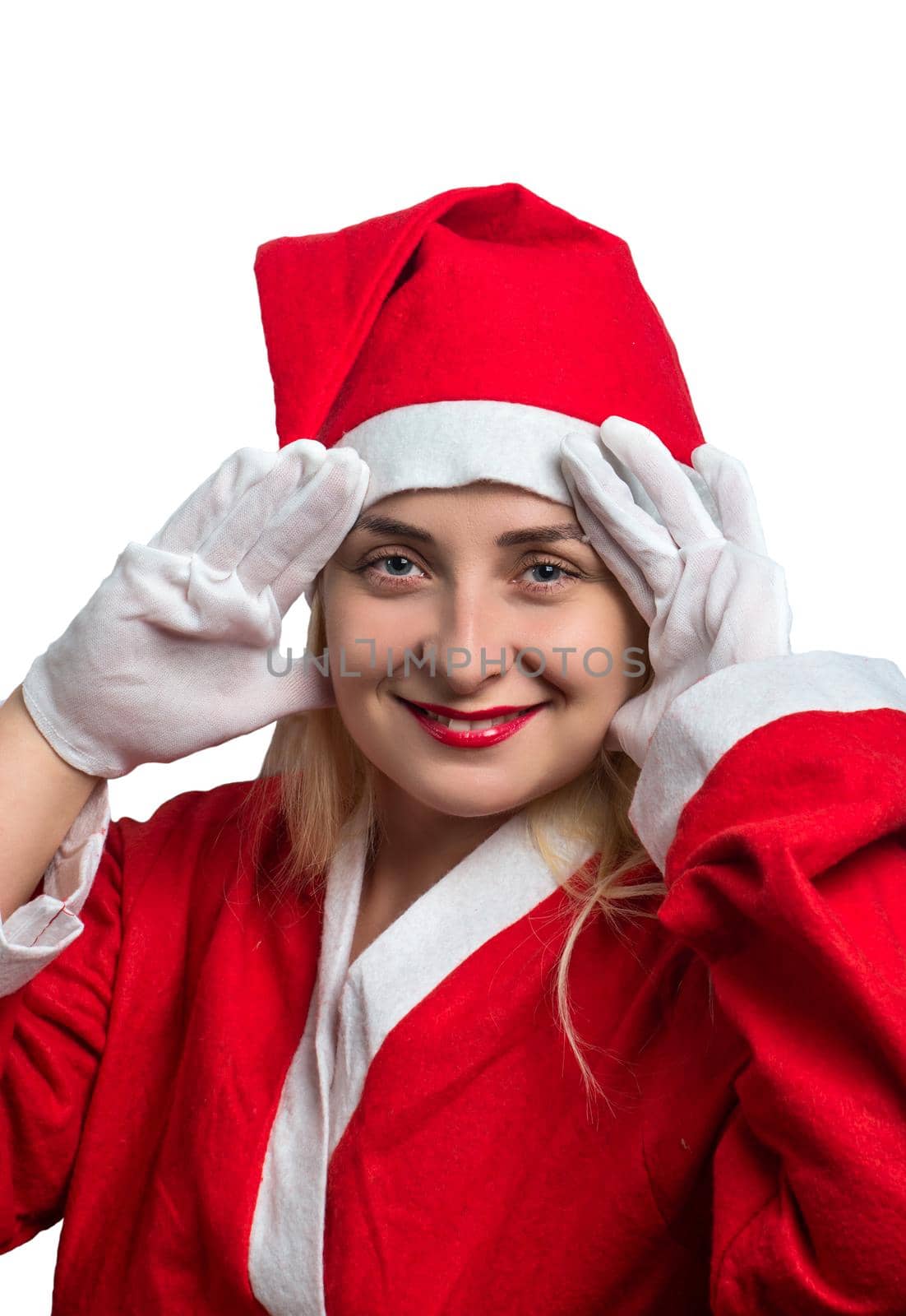 Portrait of a beautiful girl in a red suit Santa Claus on a white background