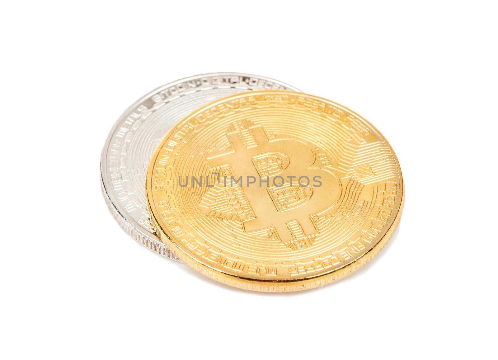 Gold and silver bitcoin coins on a white background