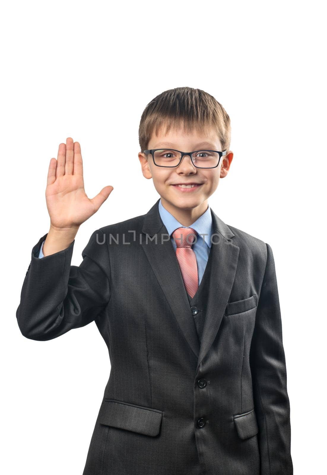 Cheerful schoolboy with glasses waving his hand on a white background