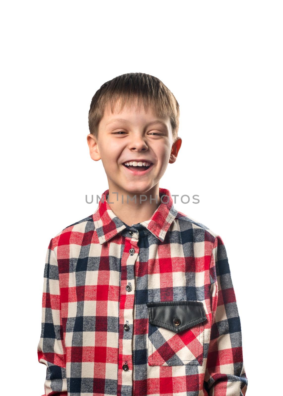 Laughing boy in a shirt on a white background