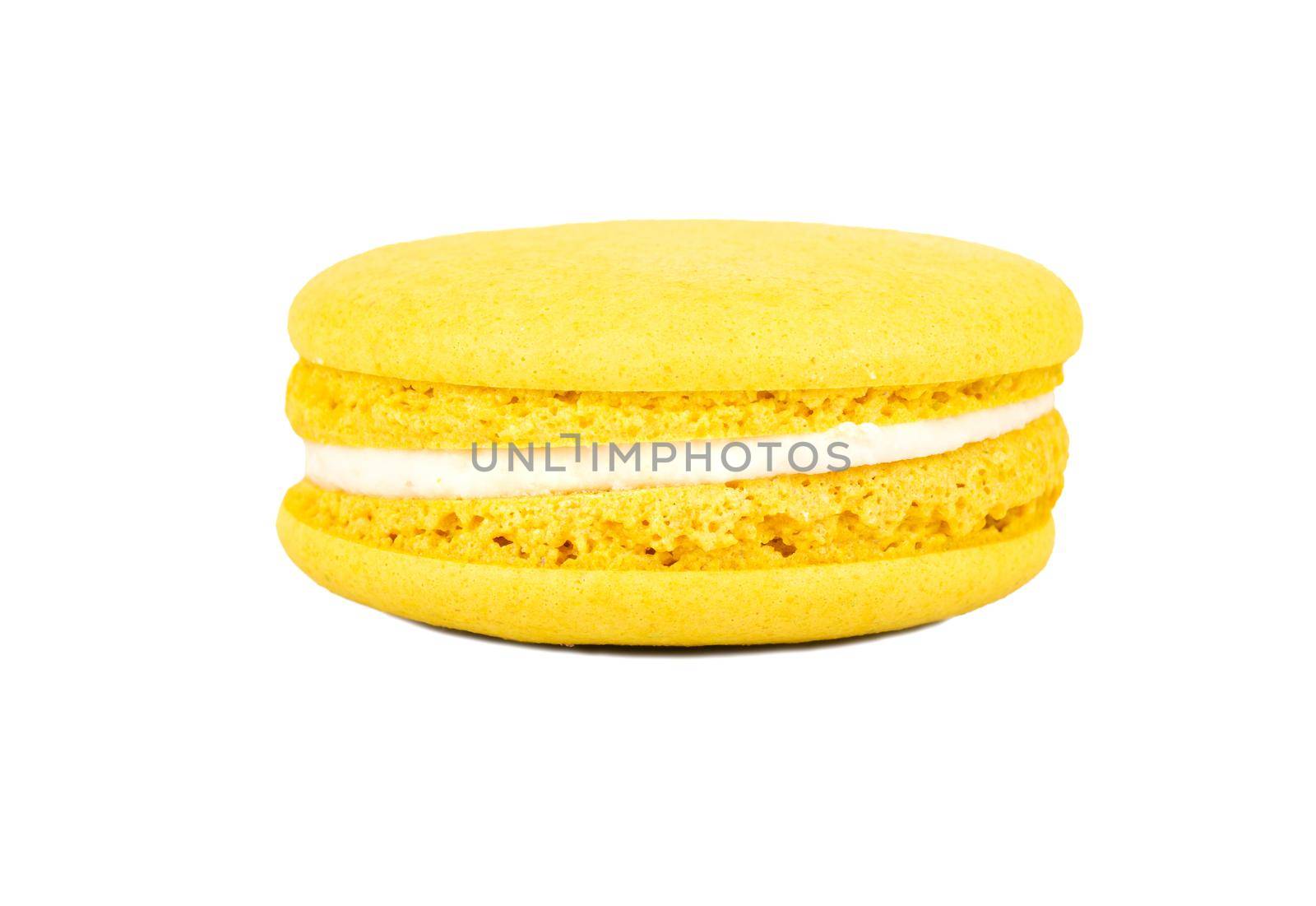 Yellow lemon macaroon isolated on white background