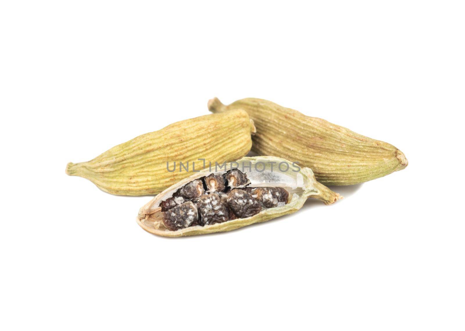 Dry cardamom with half isolated on white background