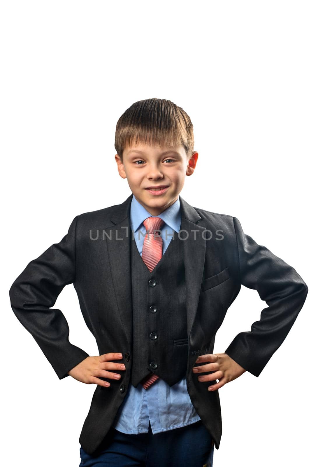 Portrait of a cute schoolboy in blazer on white background