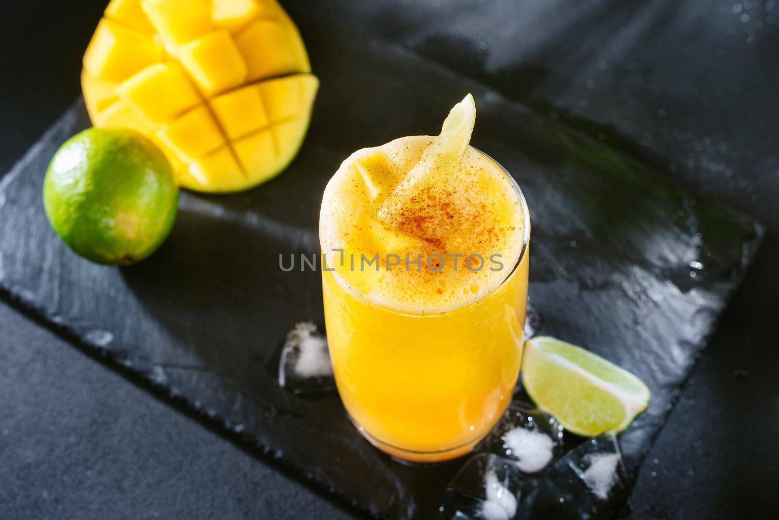 Mexican or Latin American cuisine. The classic Mexican and Southern U.S. cocktail is the Mangonada. A refreshing cocktail of mango salt and lime and chili peppers by gulyaevstudio