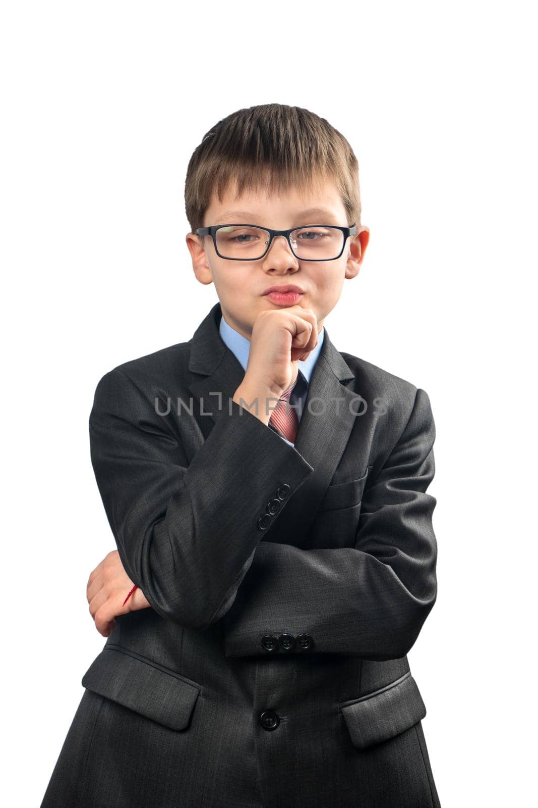 Portrait of a schoolboy making these faces on a white background