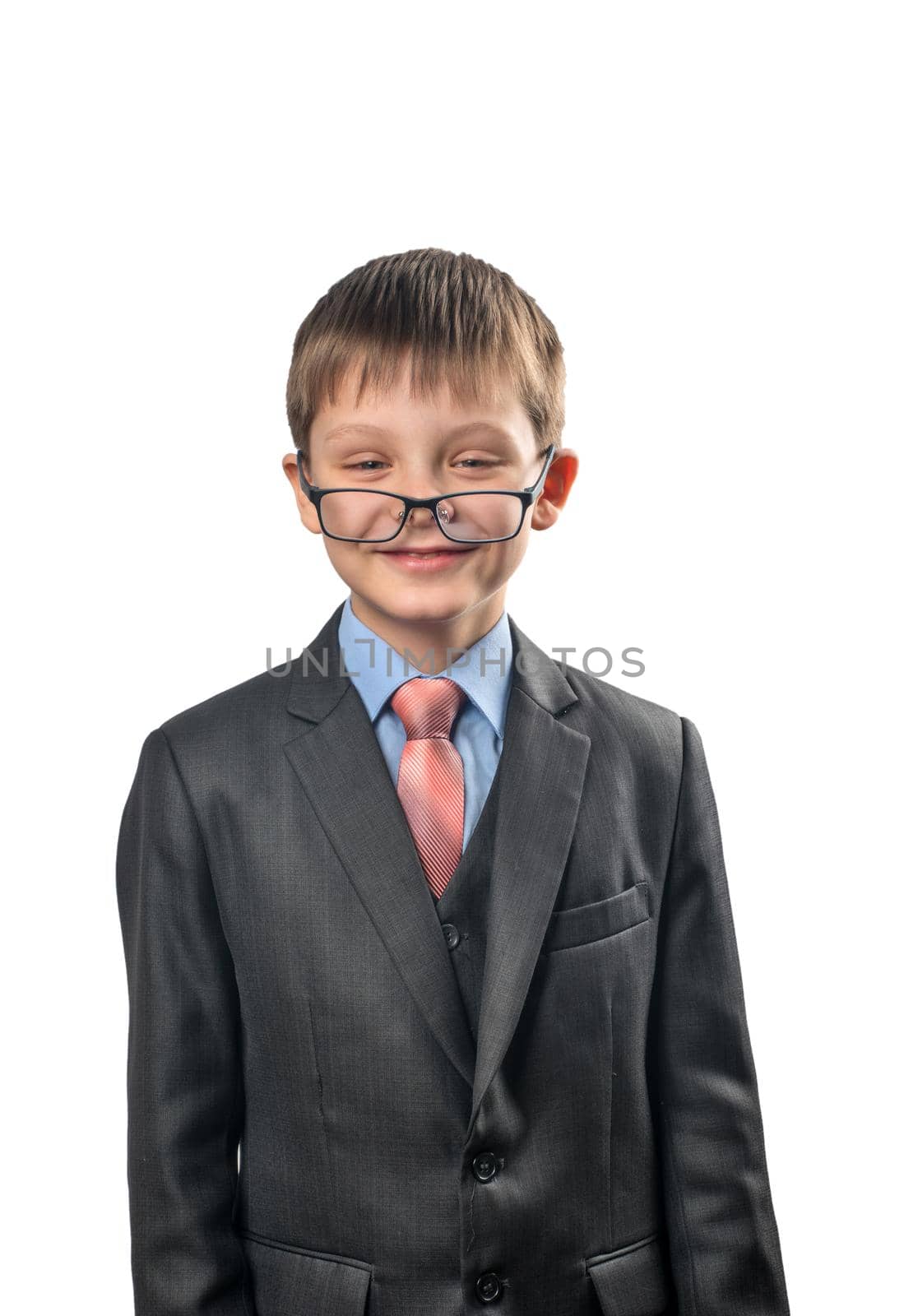 Portrait of a schoolboy with the glasses on his nose on white background