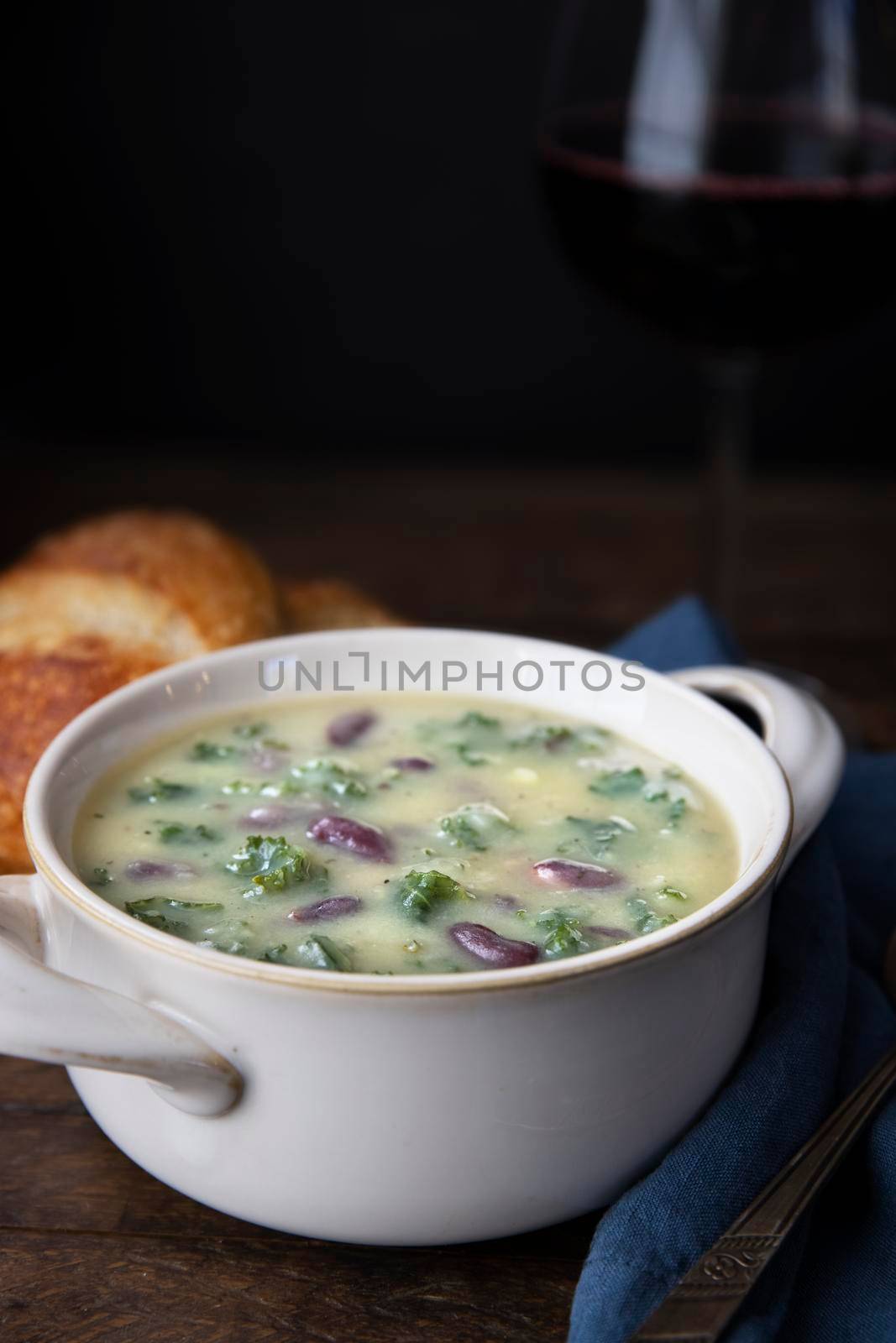 Portuguese Caldo Verde soup. Vertical format with copy space.