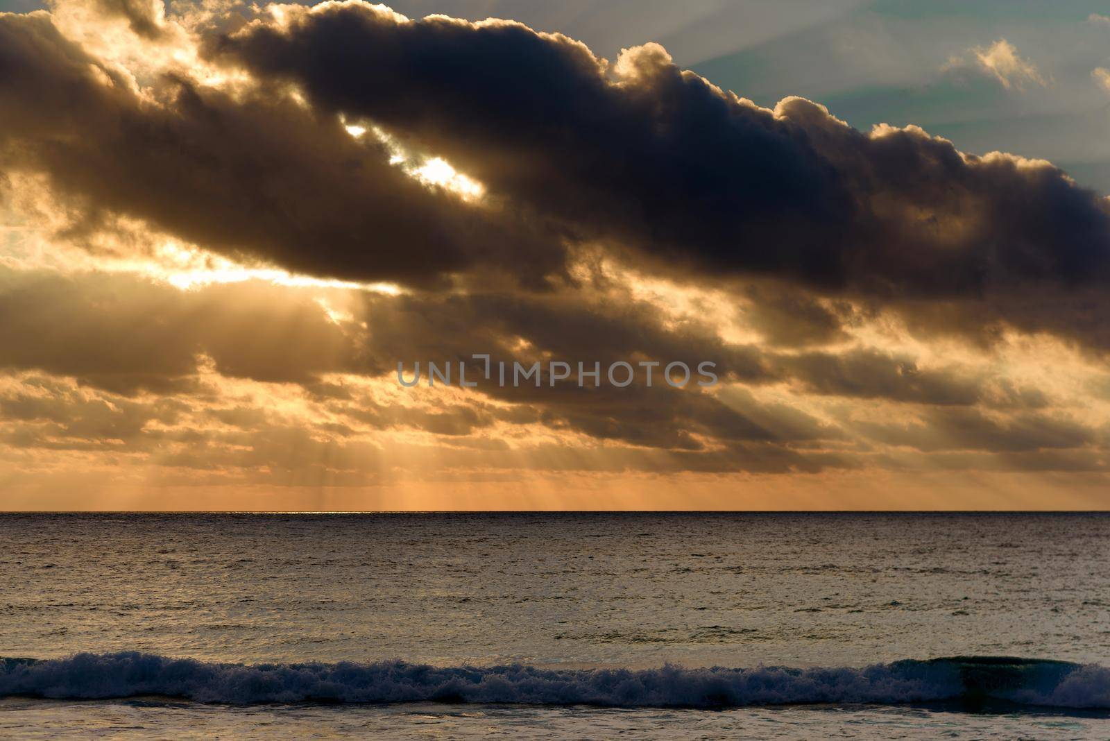 Dawn on the Caribbean Sea. Clear sky with small clouds. Clear weather.