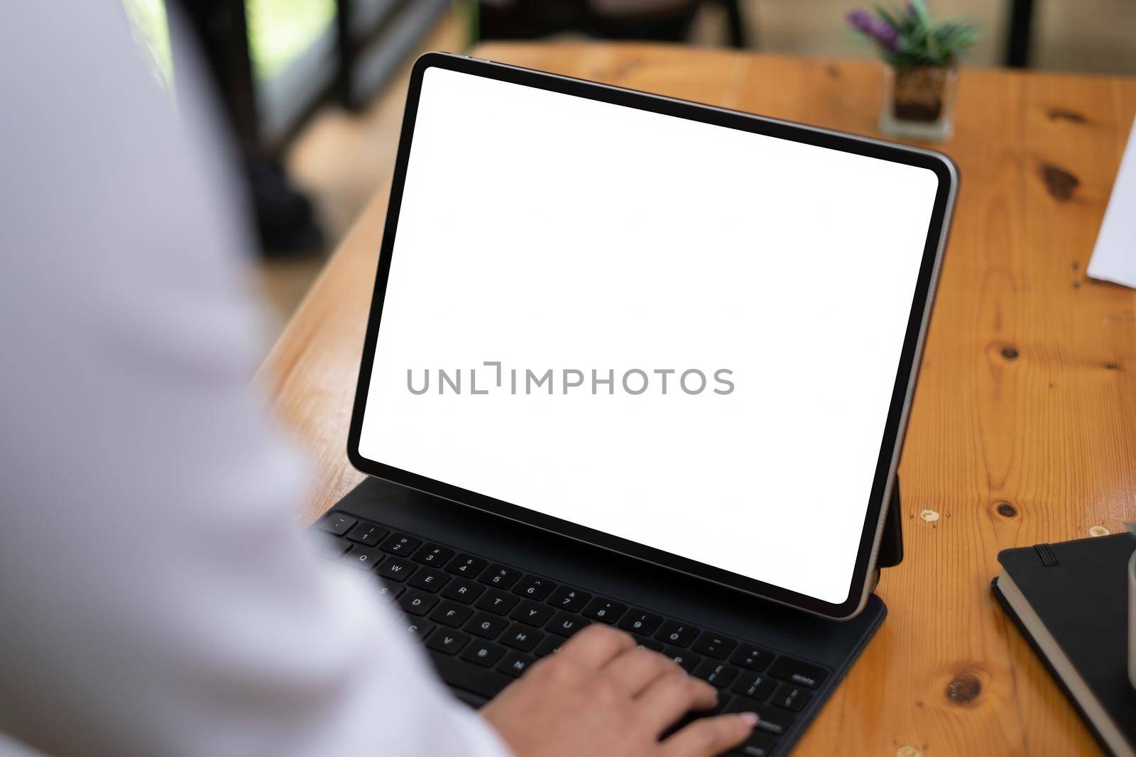 business woman holding digital tablet. Blank screen for your advertising