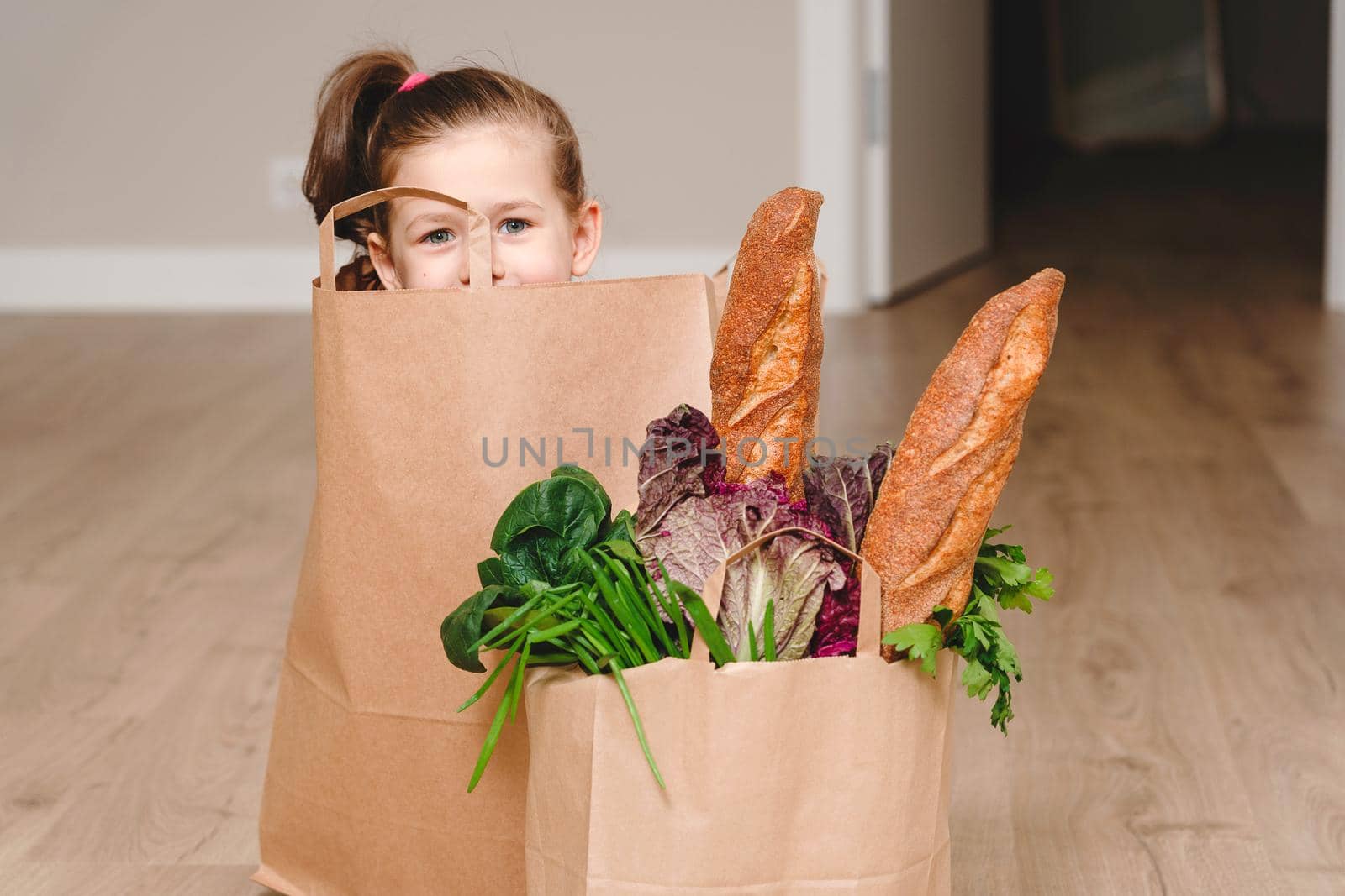 Paper bag with vegetables and some bread with copy space