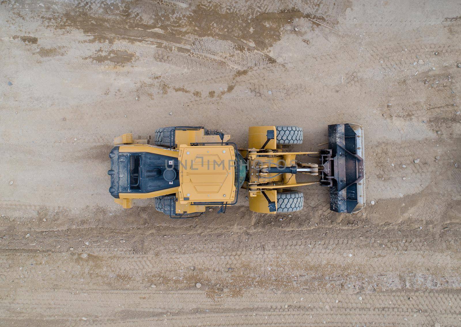 top down view of a yellow front loader