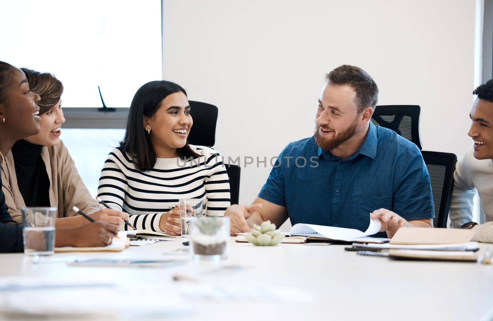 a group of business people during a meeting.