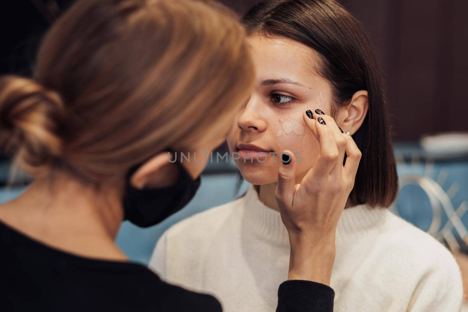 Close Up Young Woman on Beauty Procedure, Female Make Up Artist Working with the Client in Salon