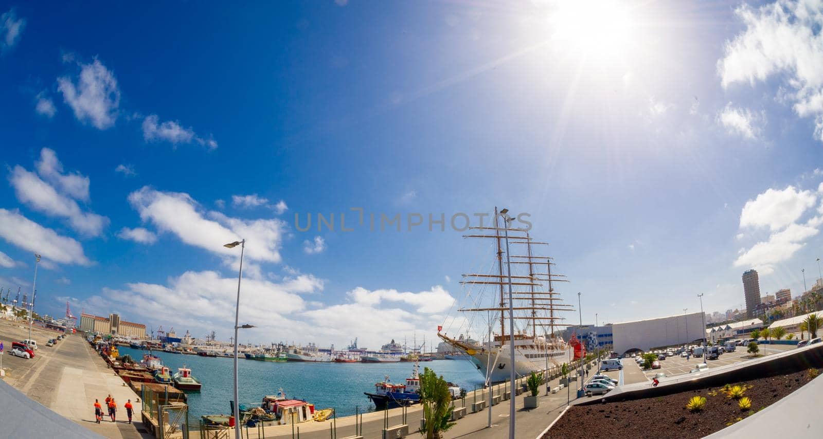 February 04 2022-Las Palmas, Gran Canaria, Spain .View on the Port of Las Palmas, Gran Canary with many kinds of passenger and cargo ships in the background and foreground