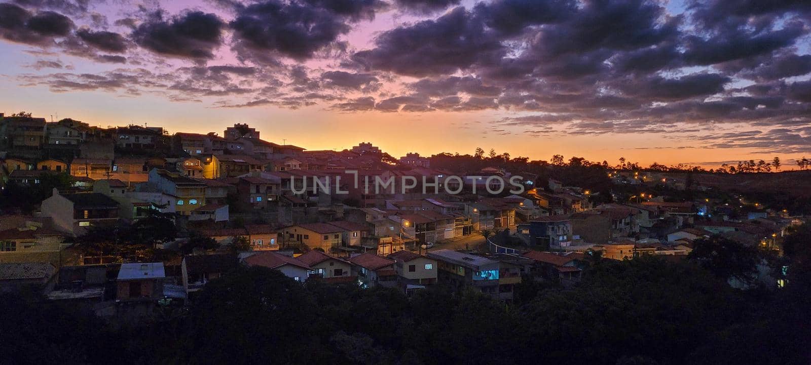 image of colorful sky with dark clouds in late afternoon in Brazil