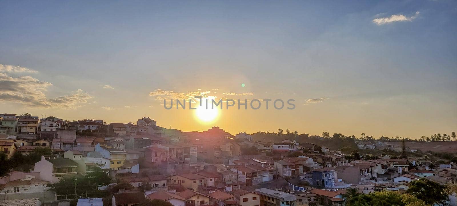 image of colorful sky with dark clouds in late afternoon in Brazil