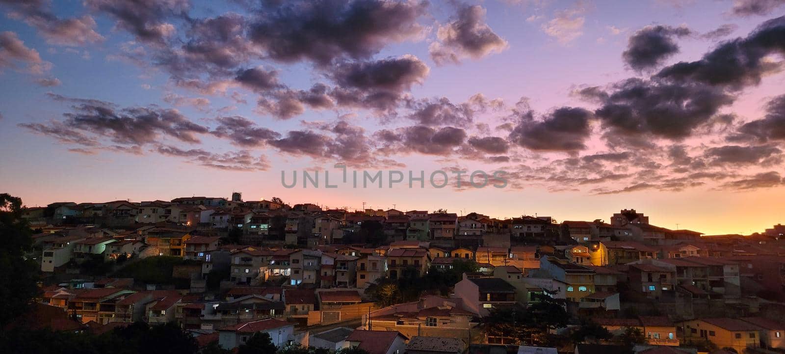 image of colorful sky with dark clouds in late afternoon in Brazil