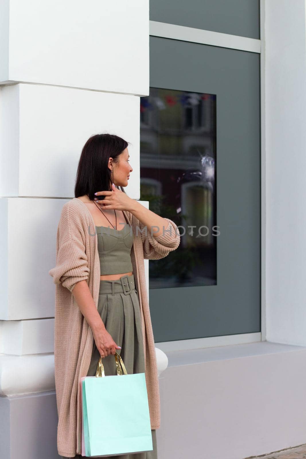 Young beautiful woman smiling going to the shops with eco bags by AleksandraLevkovskaya