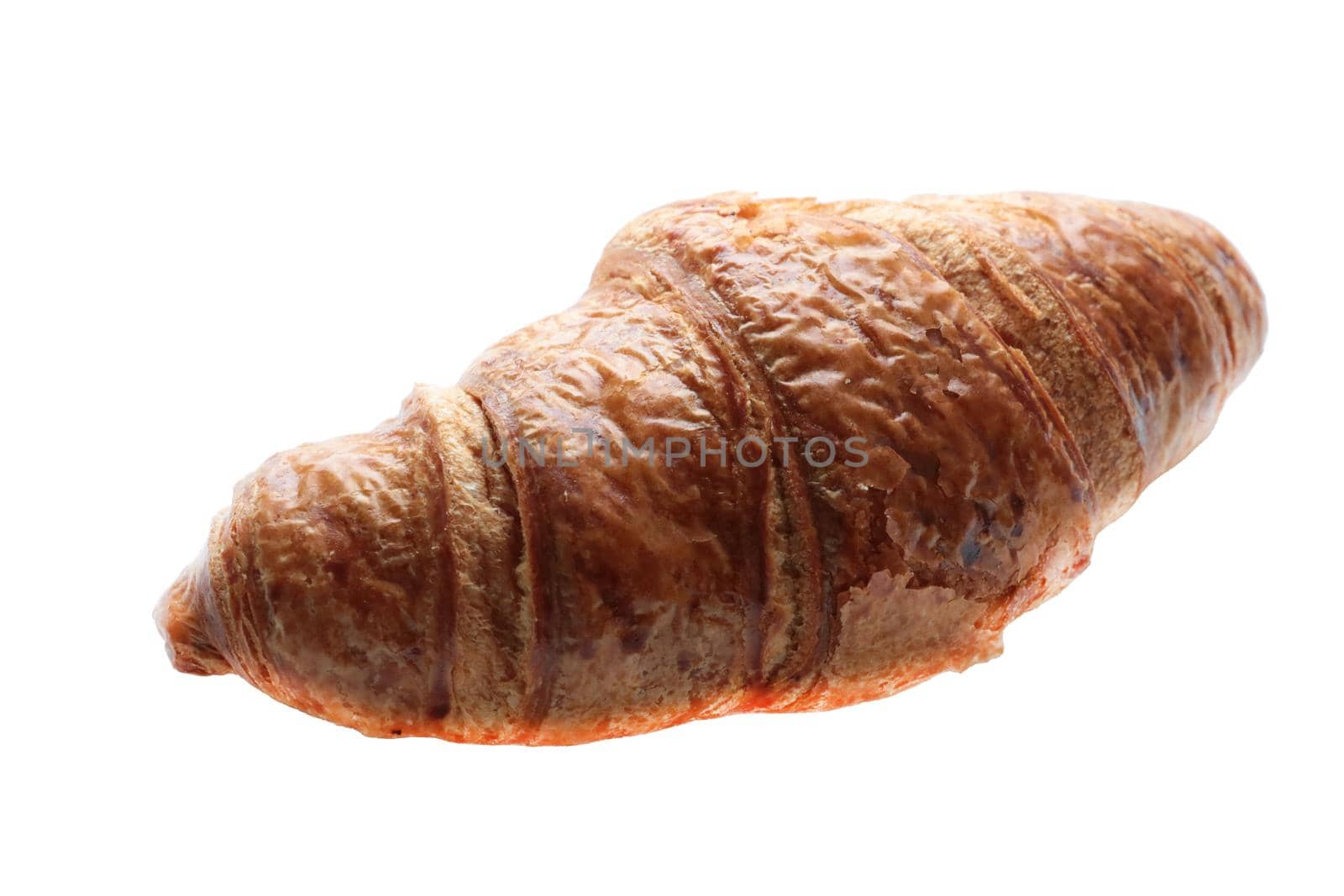 Food isolate. On a white background is a fresh croissant. Homemade cakes