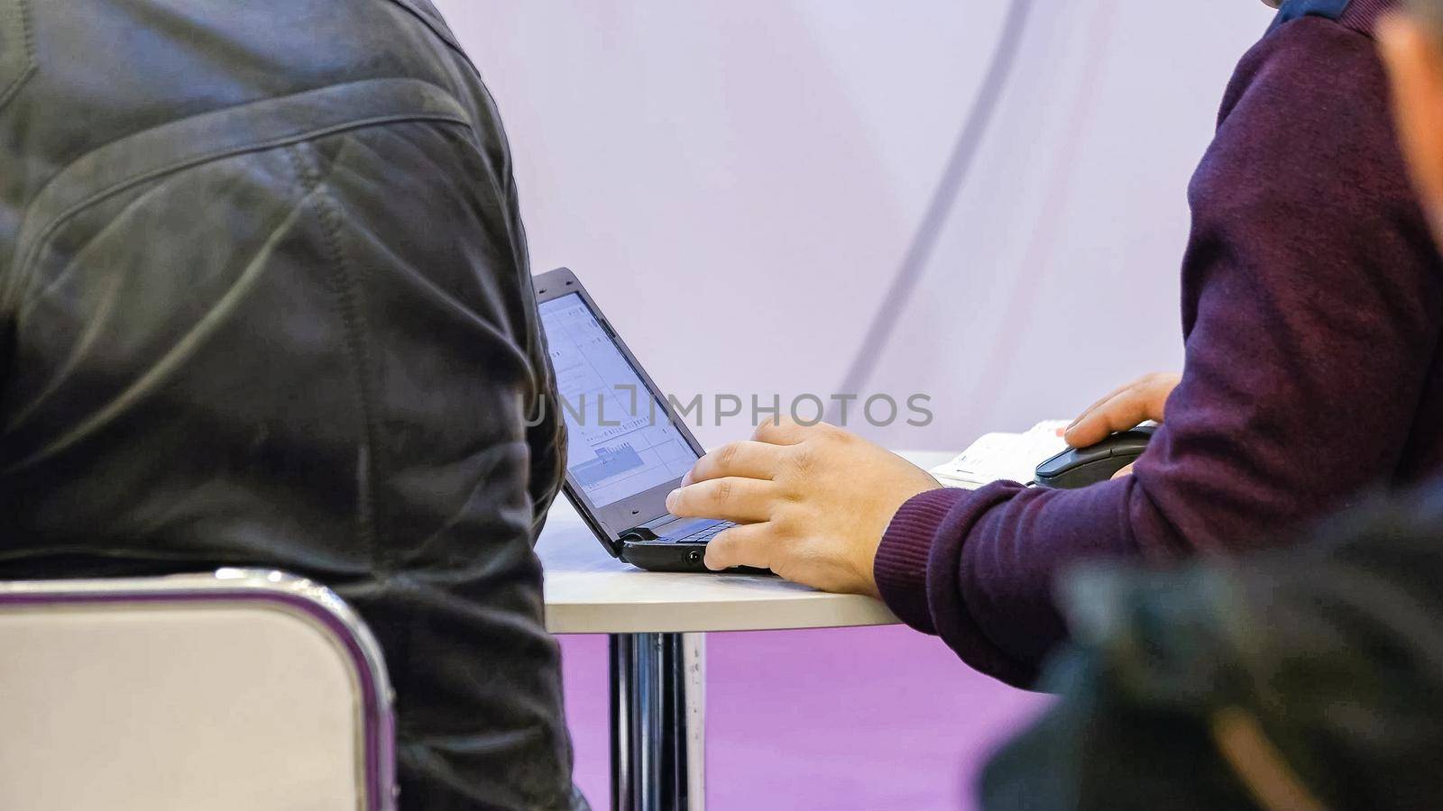 Close-up caucasian male hands typing on laptop pc. Working or studying.